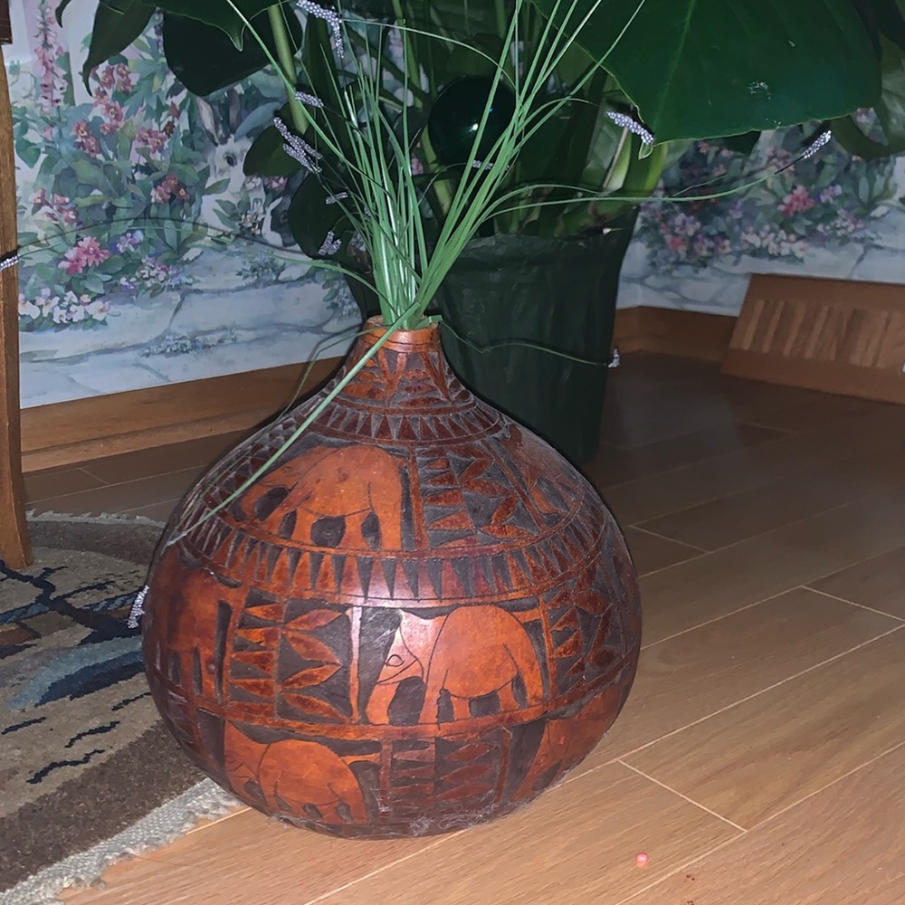 Hand-carved African gourd calabash vase decorated with geometric patterns